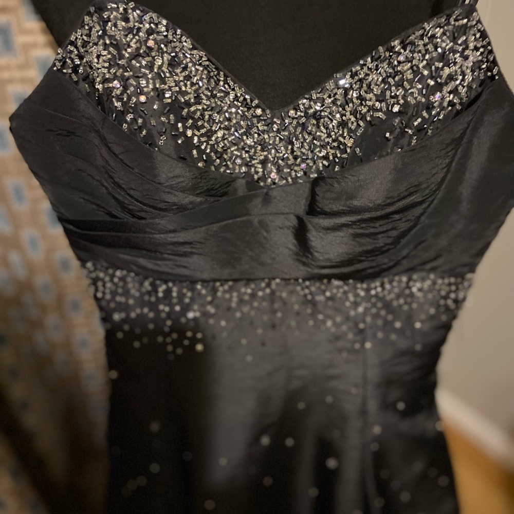 This is a short black and gray sequence evening  dress by A Speed